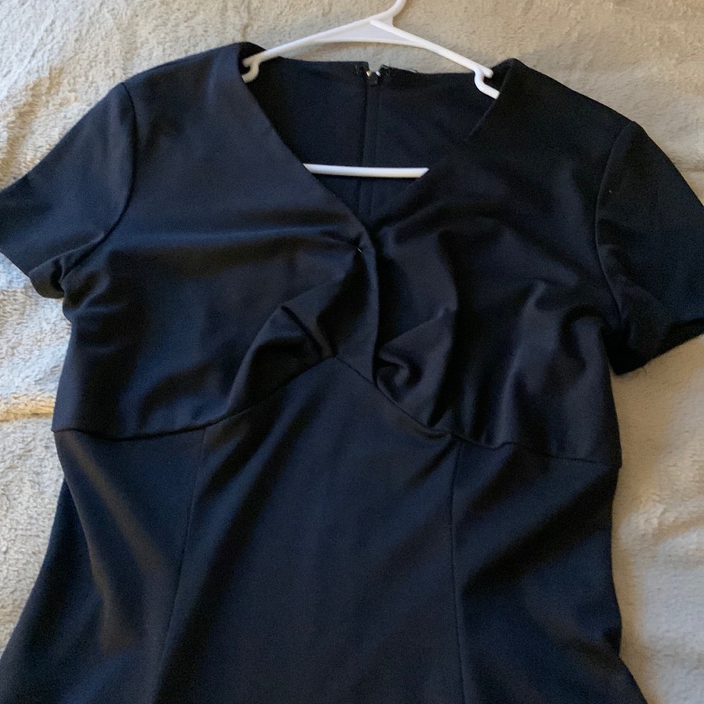 I’m selling this floor length black dress.